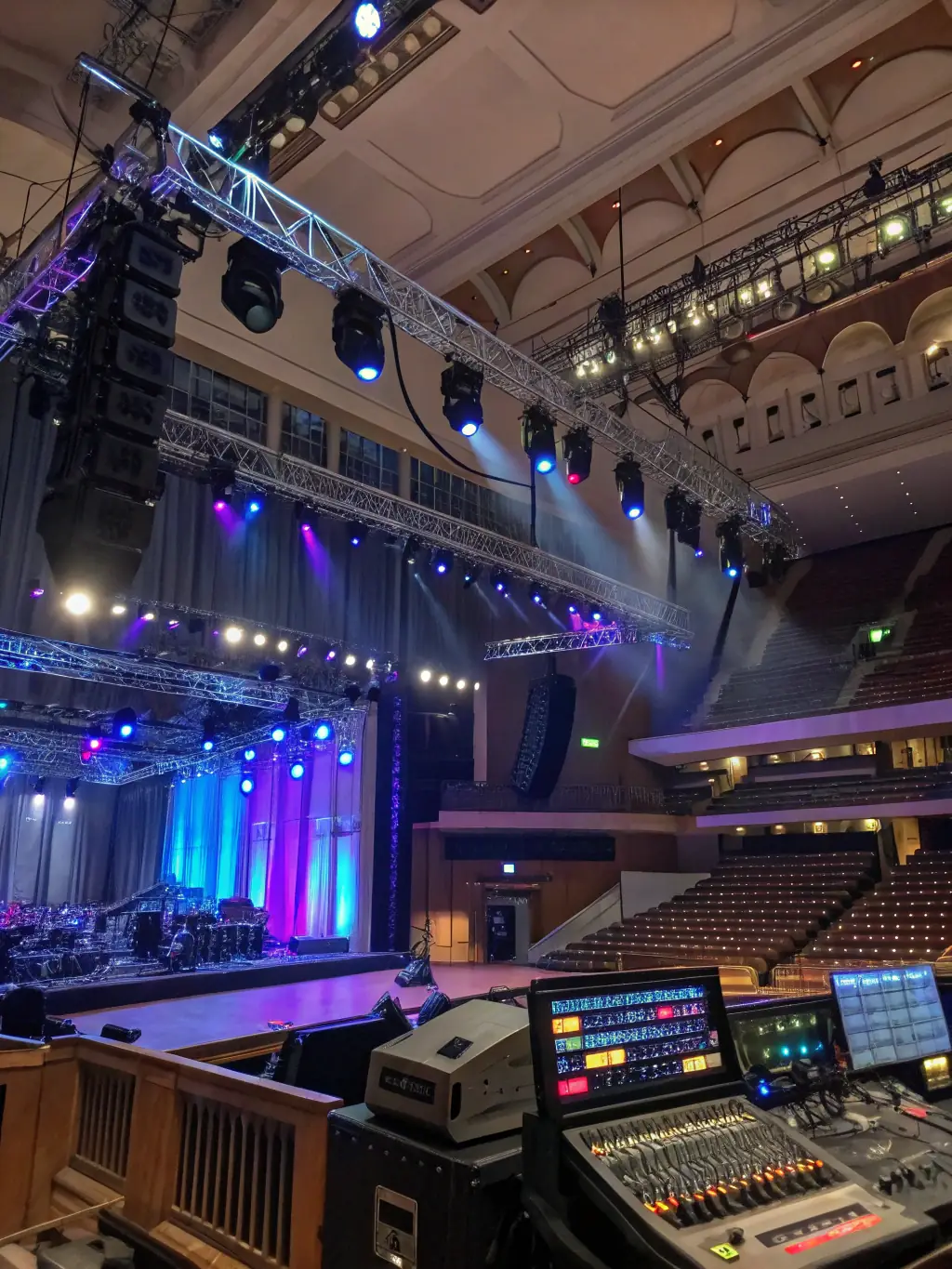 Sound and light technicians setting up equipment for a grand opening event, ensuring optimal audio and visual performance. The venue is being transformed into an immersive entertainment space.